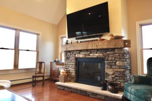 stone fireplace in a home remodel