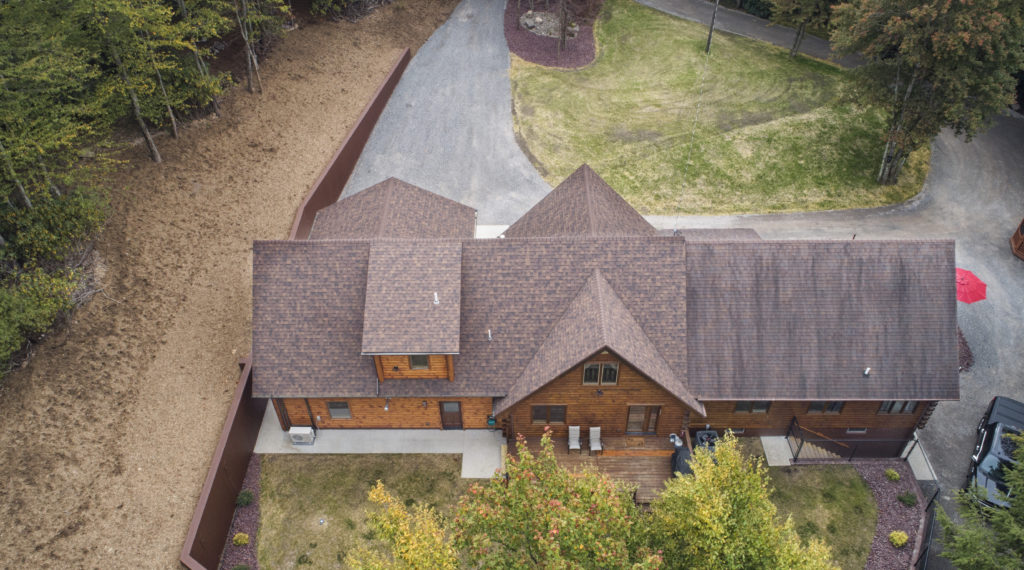 aerial view of a home addition with a new roof
