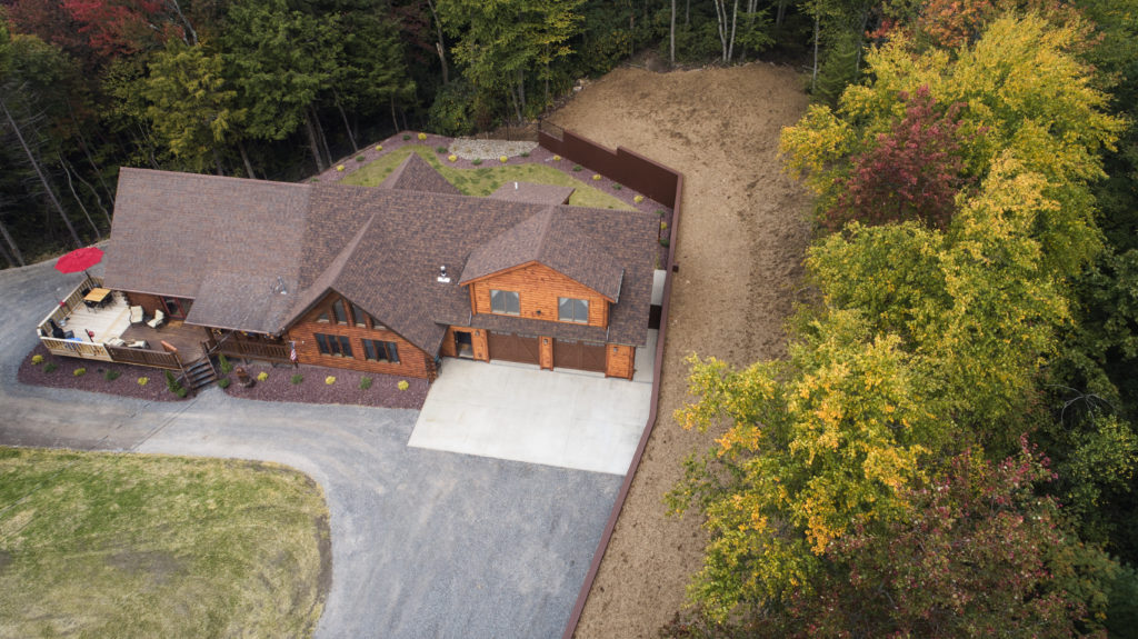 aerial view of a home addition with a new roof