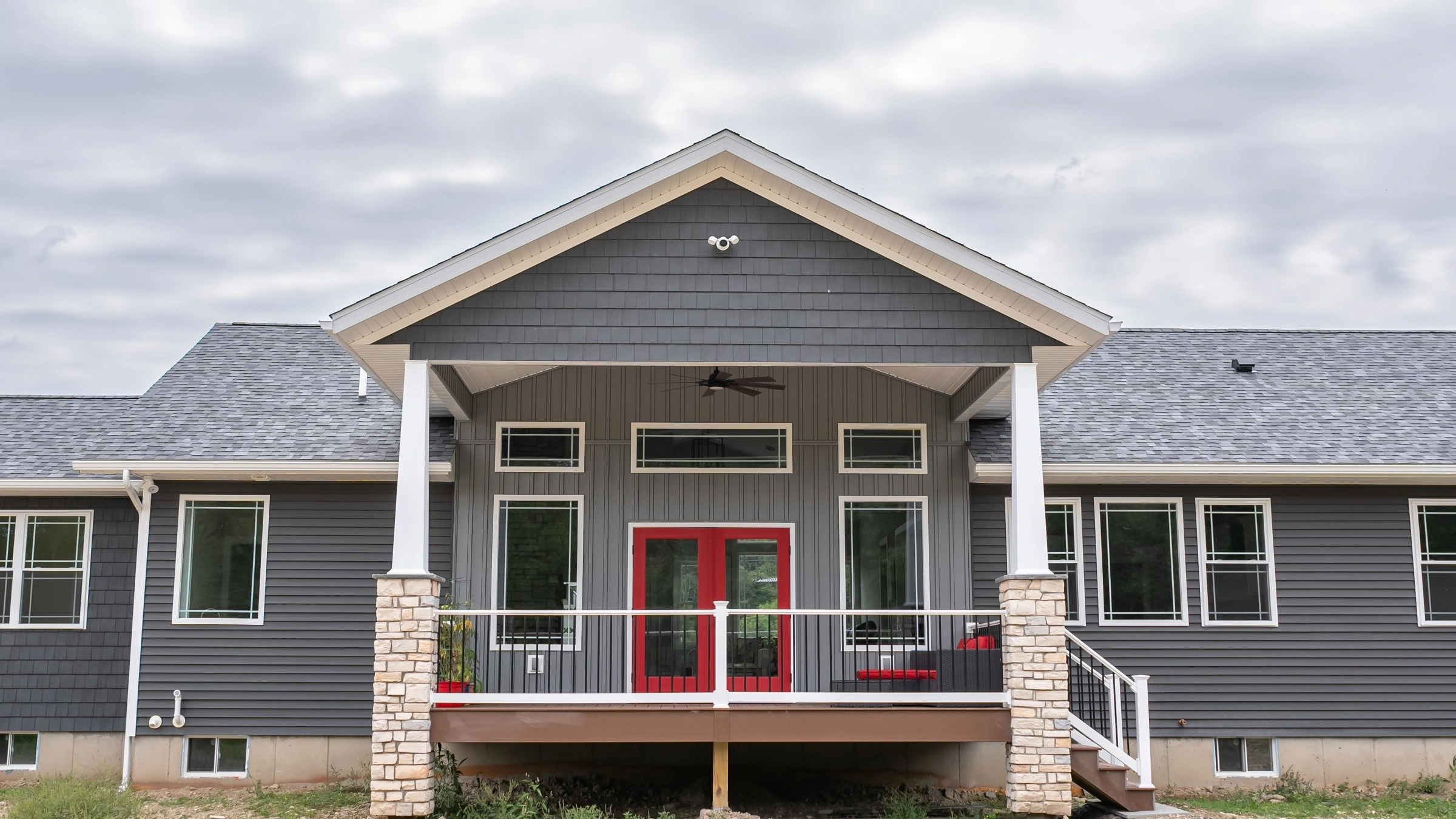 Gray Home with Red Entry Door