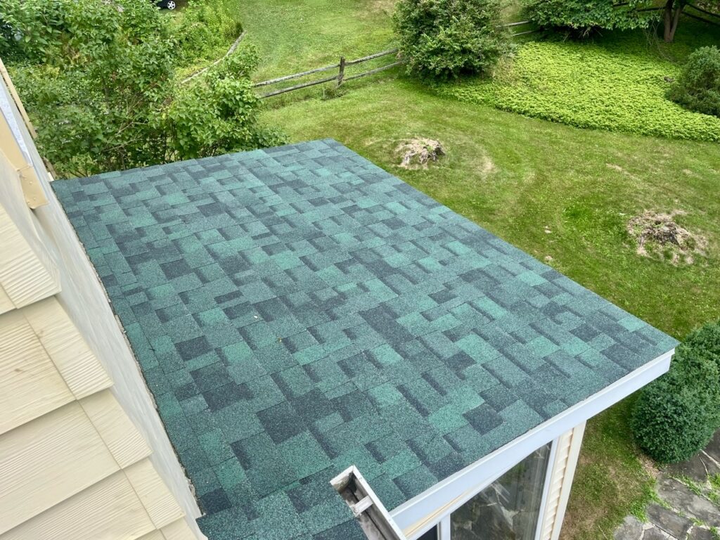 Architectural Shingles on a repaired  section of a flat roof