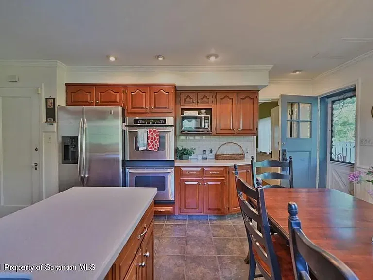 dining space and kitchen area before interior remodel