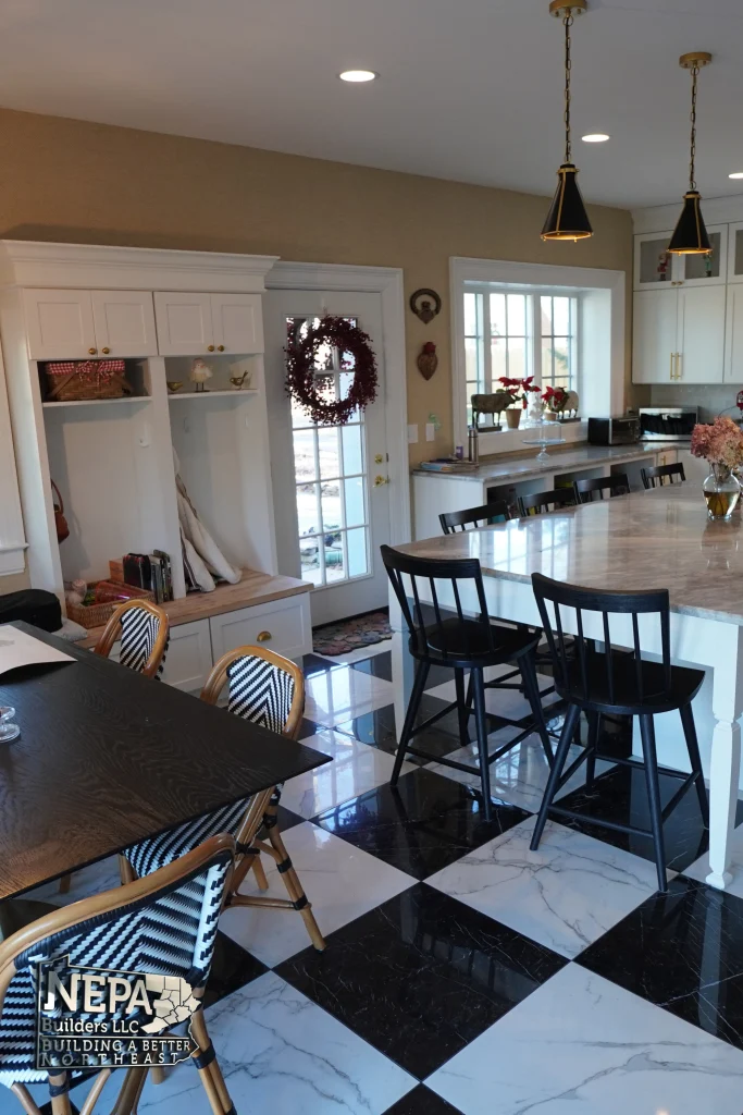 kitchen, dining, and living space connected in remodel