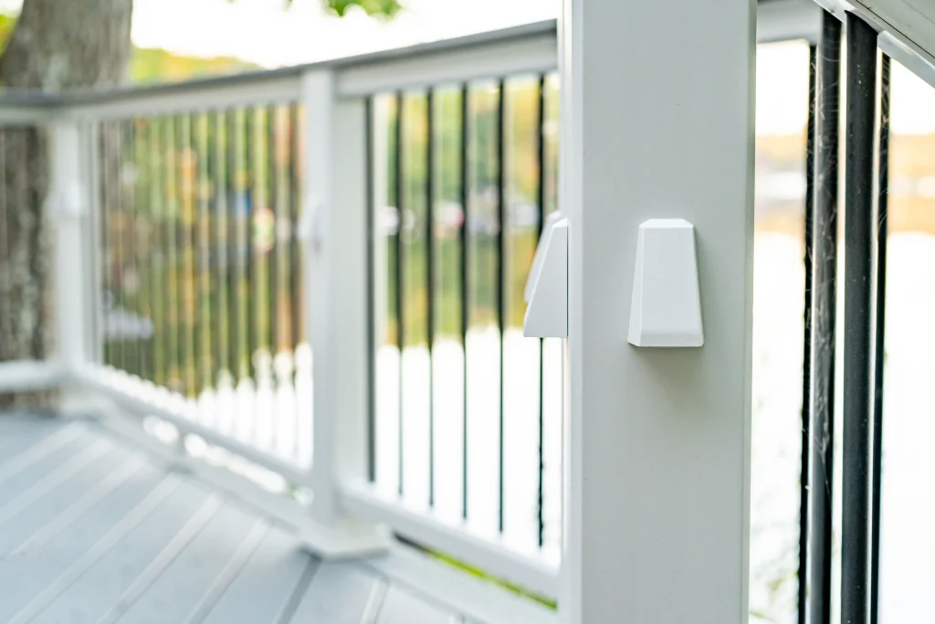 Close-up of the original unlit railing posts before a custom Trex deck and integrated TexDeck lighting upgrade by NEPA builders.
