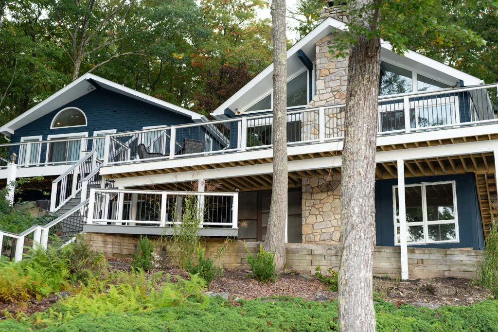 Original home exterior and wood deck layout before a custom Trex deck and TexDeck remodel by NEPA builders in Pennsylvania.