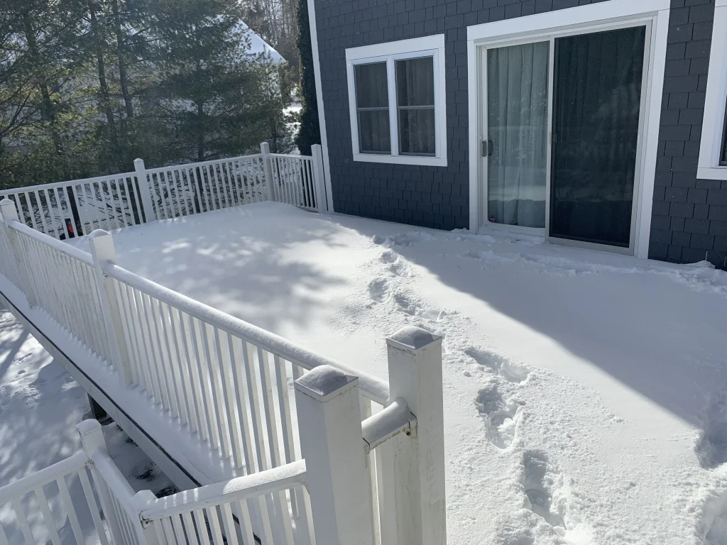 snow covered deck before installation - Uniondale