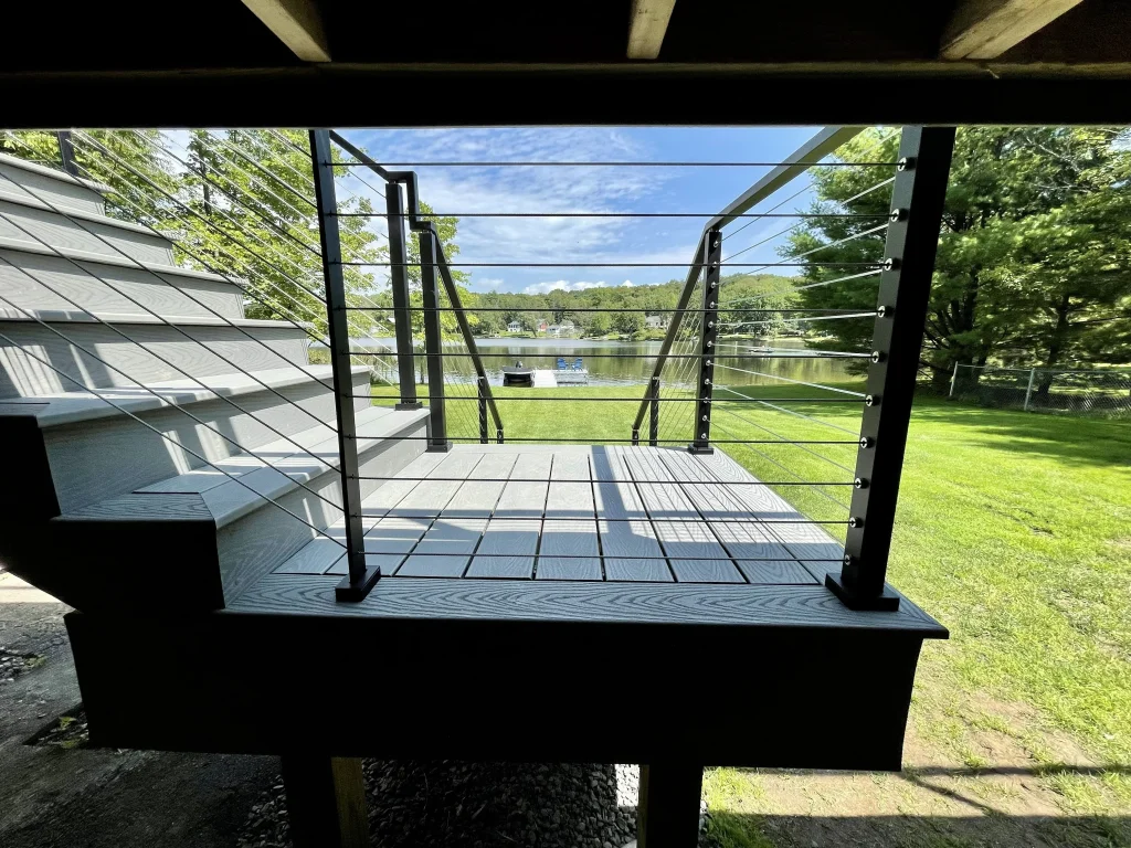 L shaped stair installation under deck view