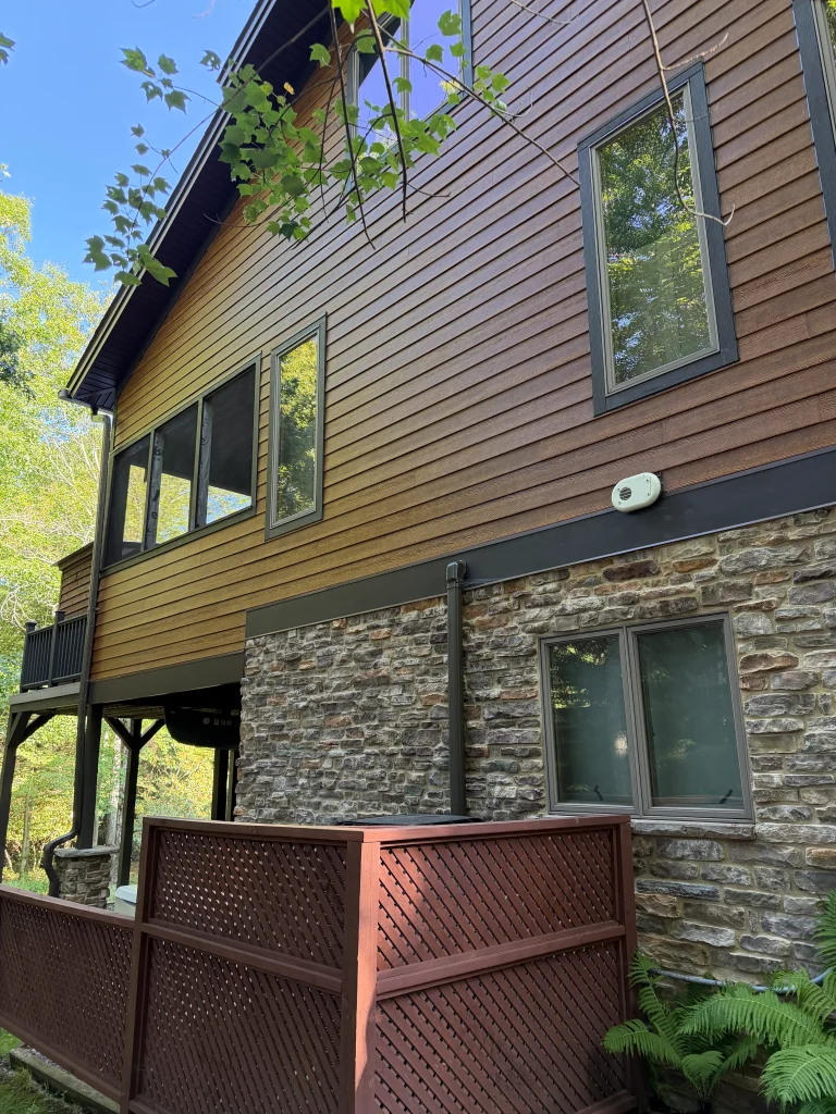 Fiber cement siding installation; exterior left side of home